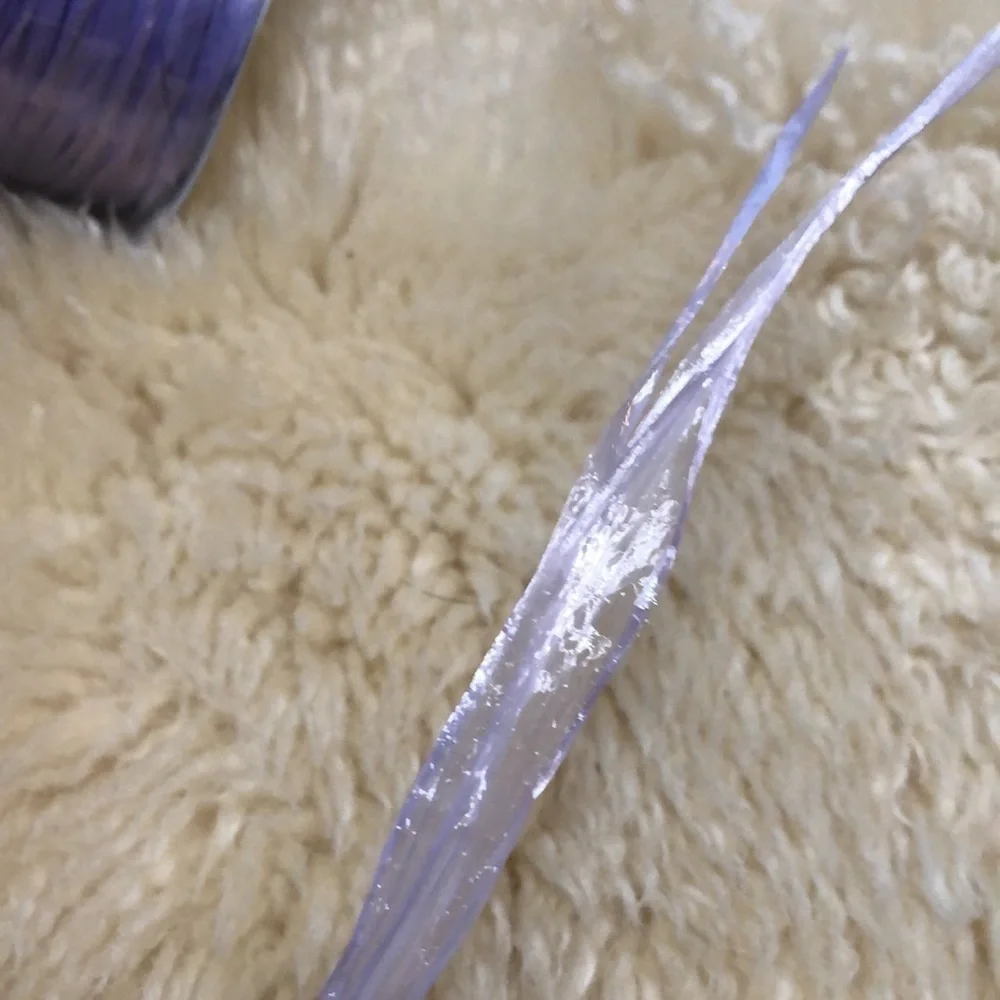 4 100 yard spools of lavender raffia